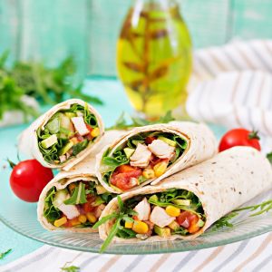Burritos wraps with chicken and vegetables on ligh 2021 08 26 23 07 05 utc 1