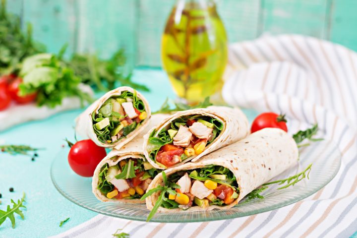 Burritos wraps with chicken and vegetables on ligh 2021 08 26 23 07 05 utc